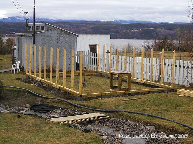 Structure d'une serre en bois - Arceaux pour serre - Comment construire une serre en verre