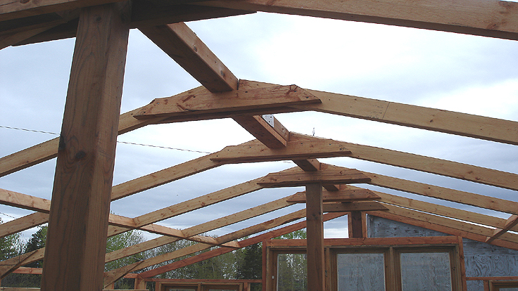Serre à ossature de bois
