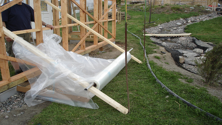 Installing greenhouse plastic